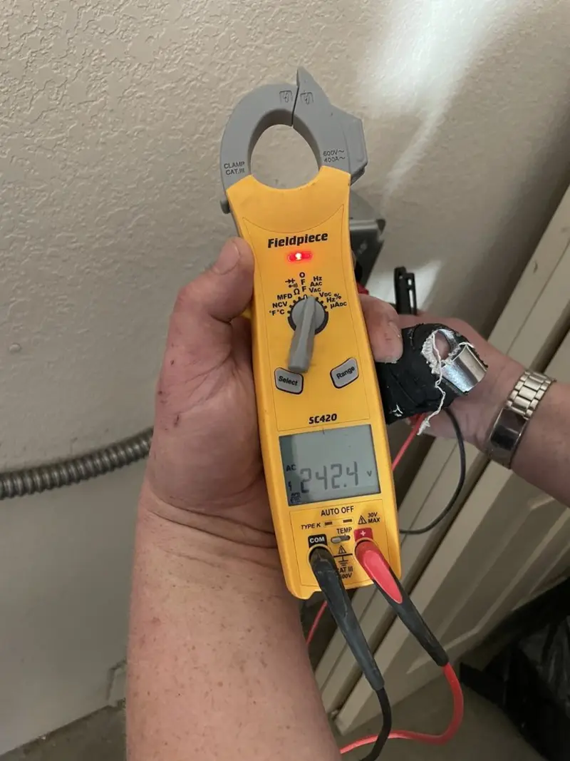 Voltage testing with clamp meter during Aluminum Wiring Replacement in Forest Park
